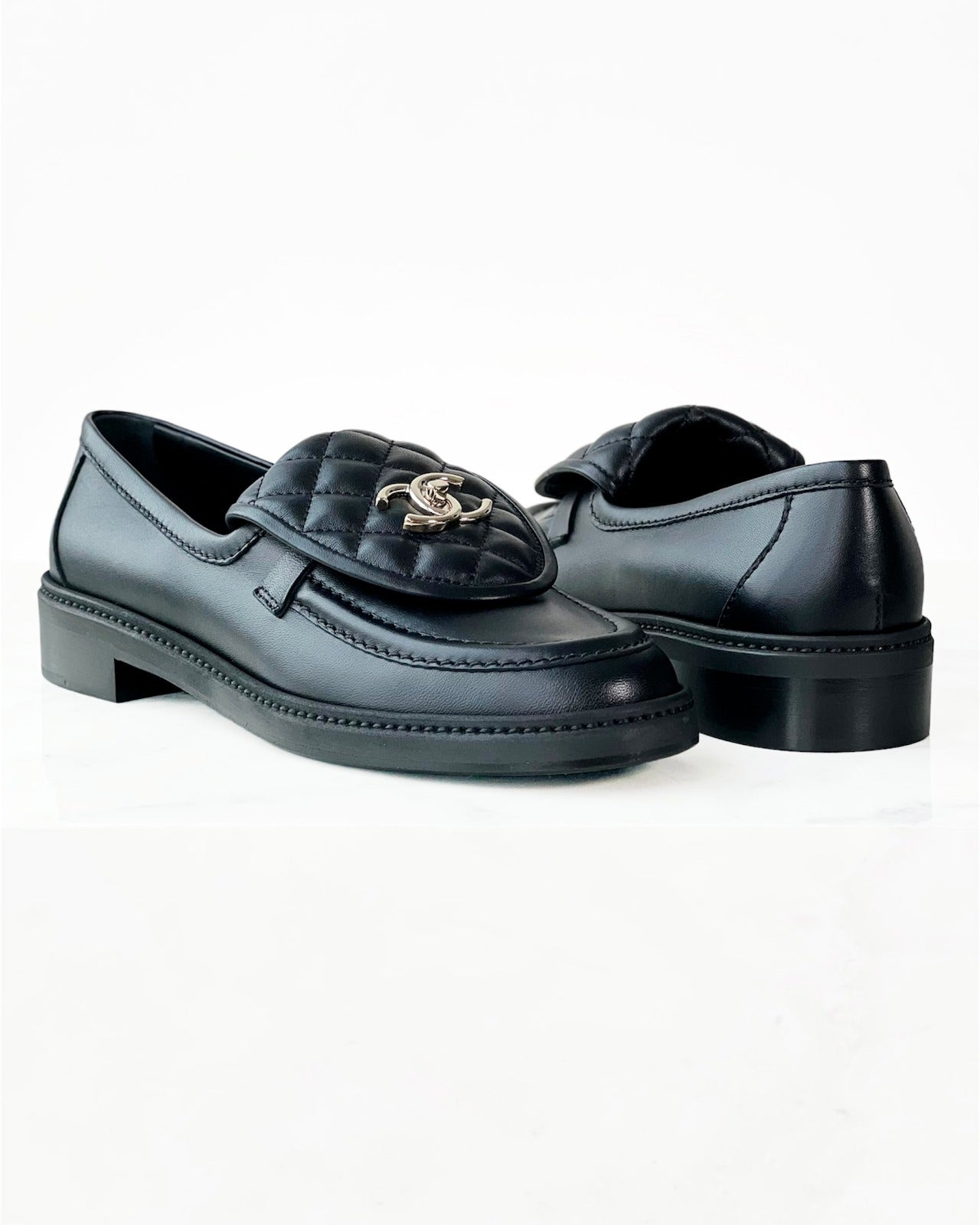 Black Quilted Tab Lambskin Flap Loafers